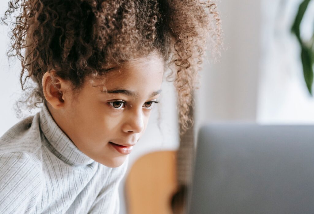 Student at a laptop, IEP and accommodations evaluations